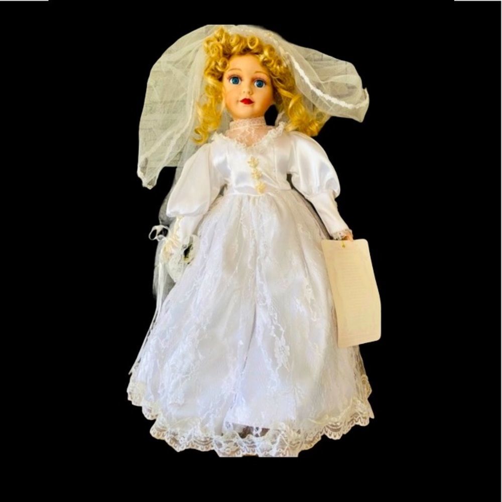 American Classics 18.5” porcelain doll “Leslie Bride”